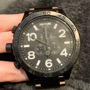 Nixon black on black watch